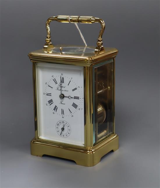 A brass repeating carriage clock height 13cm